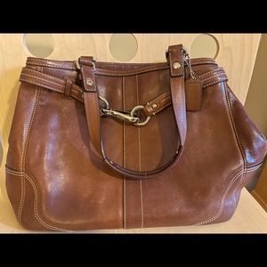 Coach brown leather handle bag.